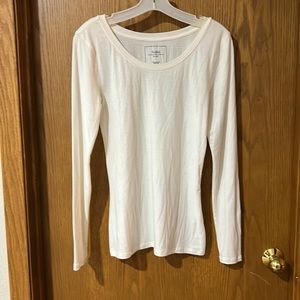 Nollie basics- vanilla white or ivory color top - long sleeve. Light weight